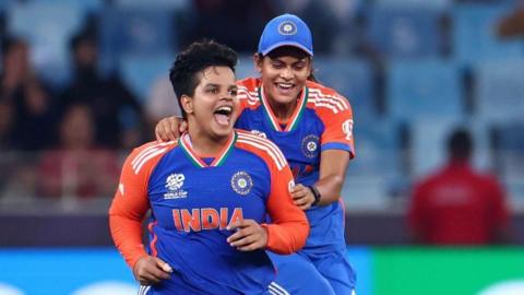 India's Shafali Verma and Radha Yadav celebrate a wicket against Sri Lanka