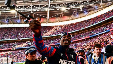 Jean Philippe Mateta celebrates winning the FA Cup with the Crystal Palace fans