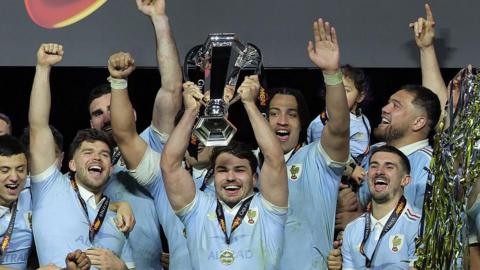 France celebrating with trophy after winning Six Nations.