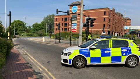 A police vehicle at the scene