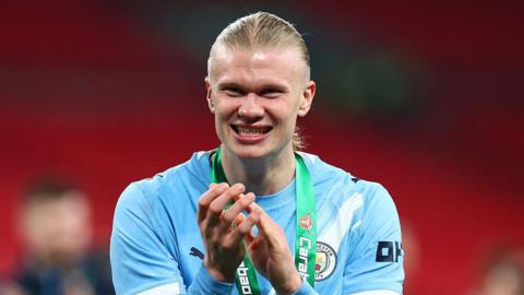 Erling Haaland celebrates winning the Carabao Cup with Manchester City