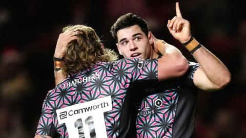 Ben Grondona celebrates a try for Bristol