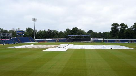 Covers on the pitch at Sophia Gardens in Cardiff