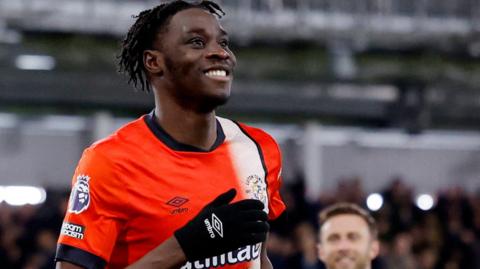 Elijah Adebayo celebrates a goal for Luton