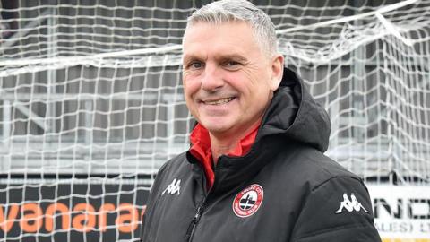 Truro City manager John Askey smiling 