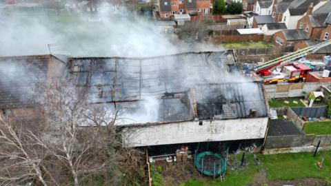 The site was still smouldering by Friday morning and the roof seemed to have been destroyed.