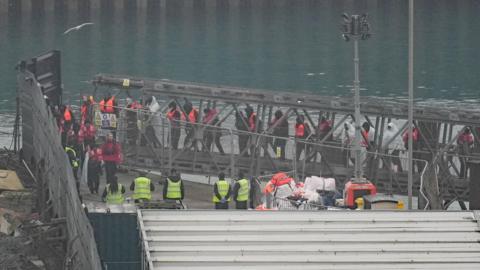 A group of people thought to be migrants are brought in to Dover, Kent, from a Border Force vessel following a small boat incident in the Channel. 