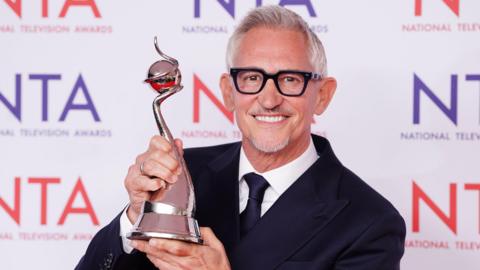 Gary Lineker with his NTA award for best presenter