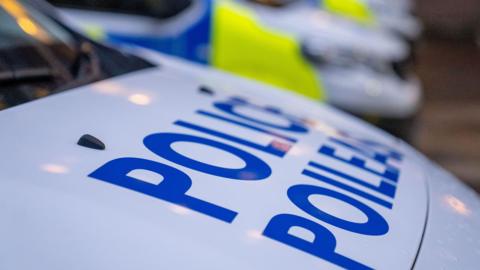 Close up of police car bonnets