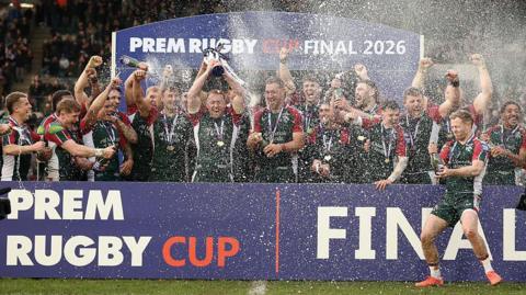 Tommy Reffell of Leicester Tigers lift the trophy following the PREM Rugby Cup match between Leicester Tigers and Exeter Chiefs at Mattioli Woods Welford Road Stadium.