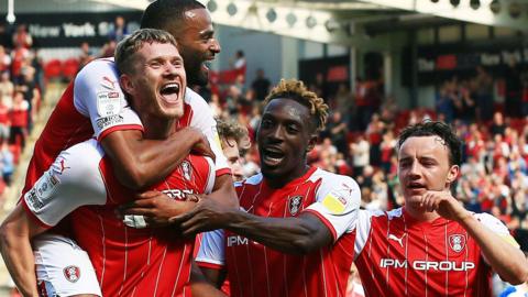 Rotherham celebrate one of Michael Smith's goals against Doncaster