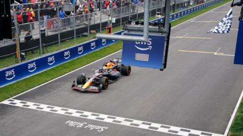 Max Verstappen crosses the line to win the Canadian Grand Prix