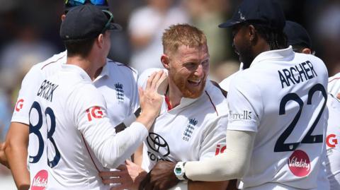 England players celebrate a wicket