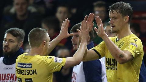 Millwall celebrate Matt Smith's opener