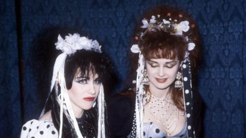 The 80s pop duo Strawberry Switchblade, in polka dot dresses. 