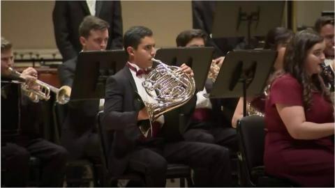 Parkland student playing the French horn