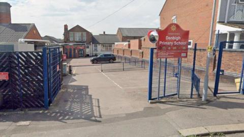 The gates outside Denbigh Primary School in Luton.