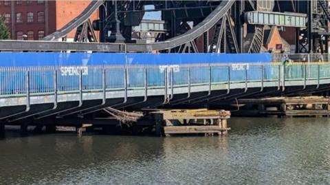 Photo from the distace of Corporation Road Bridge in Grimsby with no vehicles on it and water below