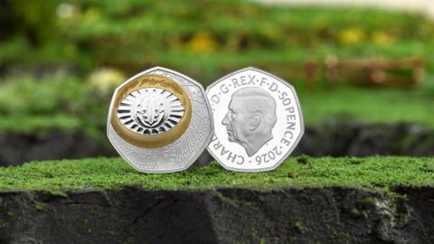 New The Lord of the Rings 50p coin on a green landscape background
