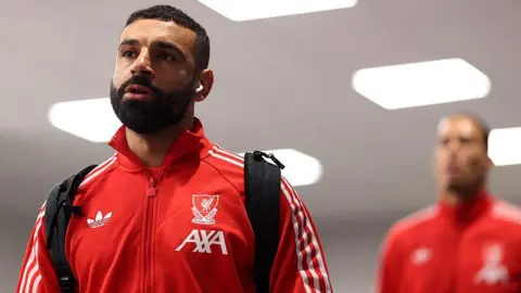 Salah arrives