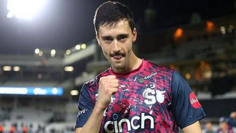 George Scrimshaw clenches his right fist in celebration after Northamptonshire beat Surrey in the T20 Blast