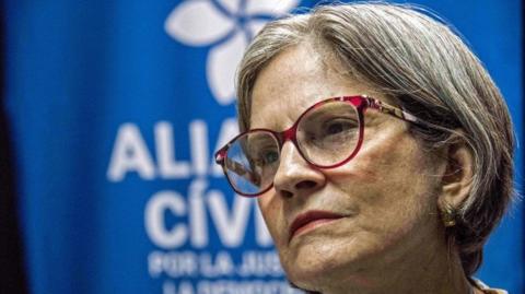 The president of the Ciudadanos por la Libertad (CxL) party, Nicaraguan Kitty Monterrey, gestures as she speaks about the detention of two of her party members in Managua on July 6, 2021