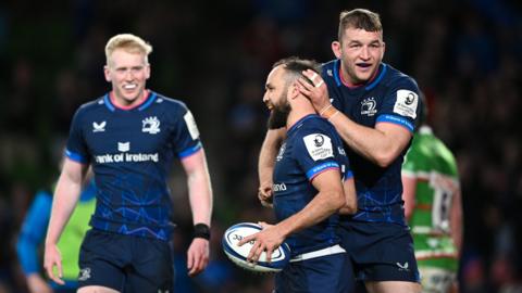 Jamison Gibson-Park celebrates his try