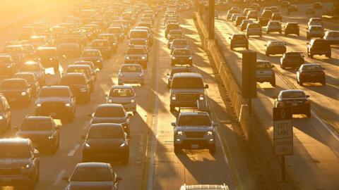Traffic backs up on Interstate 405 during the morning commute at sunrise on January 15, 2026 in Los Angeles, California