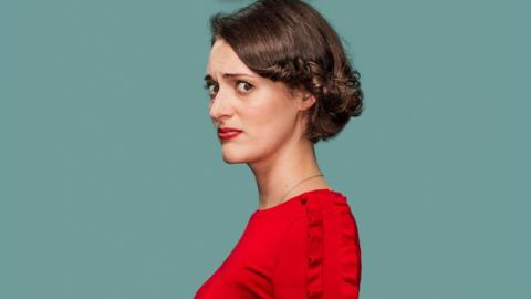 Phoebe Waller-Bridge as Fleabag, wearing a red top, with short dark hair