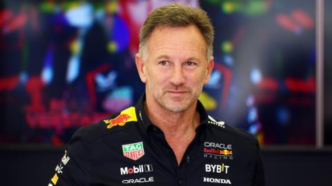 Red Bull team principal Christian Horner looks on in the garage during practice in Bahrain