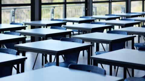 Big empty classroom at modern school.