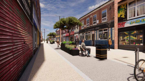 Image is a computer-generated image of a pedestrianised Bebington Road in New Ferry. The ground is covered with coloured tarmac. A man in a wheelchair sits in the centre of the image. Two people stand close to a pub in the background.