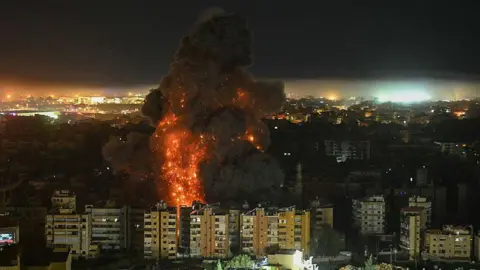 A fireball rises from the site of an Israeli airstrike that targeted an area in Beirut's southern suburbs