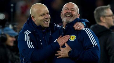 Scotland's Steven Naismith and Steve Clarke celebrate World Cup qualification