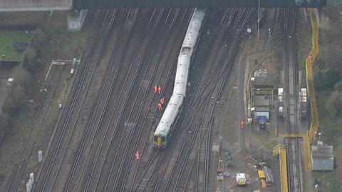 Aerial view of derailed train.
