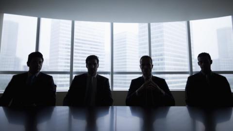 Men on an interview panel