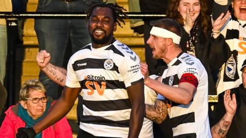 Ayr United's Tomi Adeloye (left) celebrates his goal