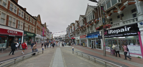 Southend High Street, a busy pedestrianised street with various shopfronts on either side