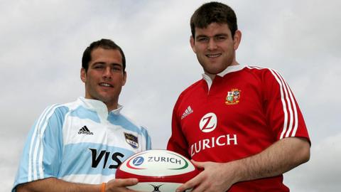 Argentina captain Felipe Contepomi (L) with British and Irish Lions captain Michael Owen