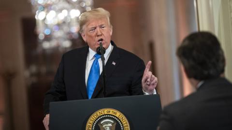 US President Donald Trump argues with CNN report Jim Acosta