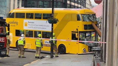Bus removed from building front
