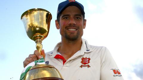 Sir Alastair Cook lifts the County Championship trophy with Essex in 2019