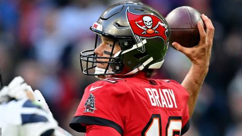 Tom Brady of the Tampa Bay Buccaneers throws a pass