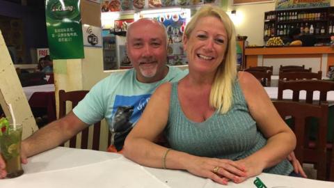 Lesley Critchett and husband Andy in a holiday snap, pictured in a bar