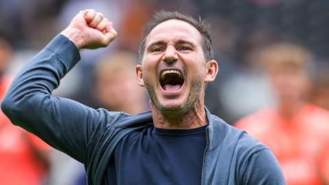 Frank Lampard punching the air in celebration.