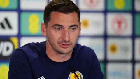 Kenny McLean speaks at a Scotland press conference in Charlotte