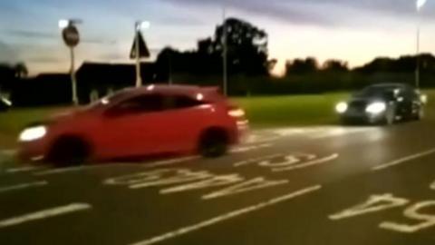 Two cars on a road near Wolverhampton