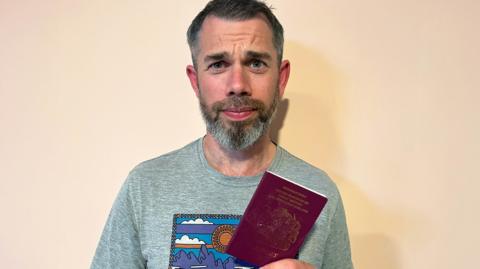 Money Box listener Simon with his passport.