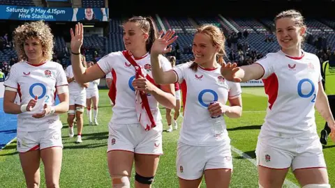 England players celebrate victory