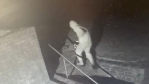 A thief caught on CCTV running away with about £500 worth of technology